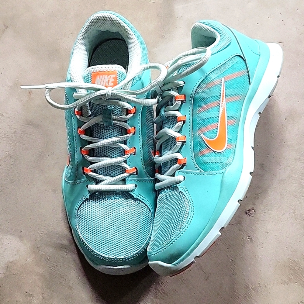 Nike Flex Trainer 4 size 6 turquoise and orange tennis shoes